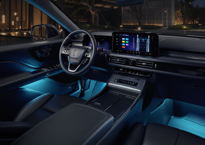 Deep blue ambient lighting glows from various places within a 2025 Lincoln Aviator® SUV. | Parks Lincoln of Wesley Chapel in Wesley Chapel FL
