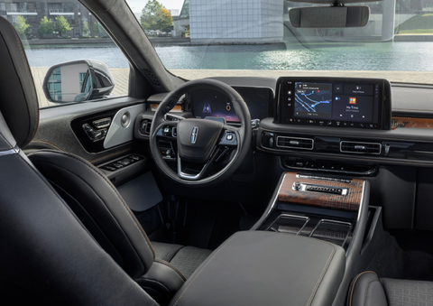The interior of the 2025 Lincoln Aviator® SUV is shown parked with a view of a harbor through the windshield. | Parks Lincoln of Wesley Chapel in Wesley Chapel FL