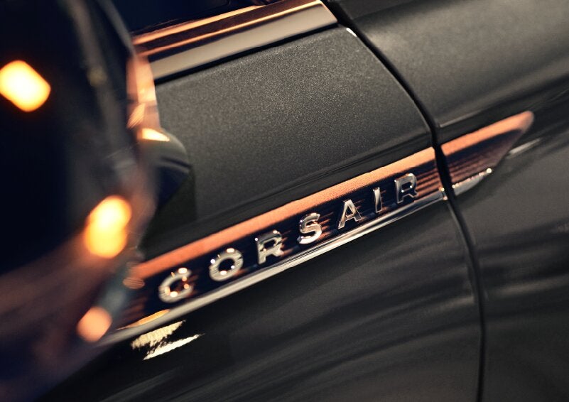 The stylish chrome badge reading “CORSAIR” is shown on the exterior of the vehicle. | Parks Lincoln of Wesley Chapel in Wesley Chapel FL