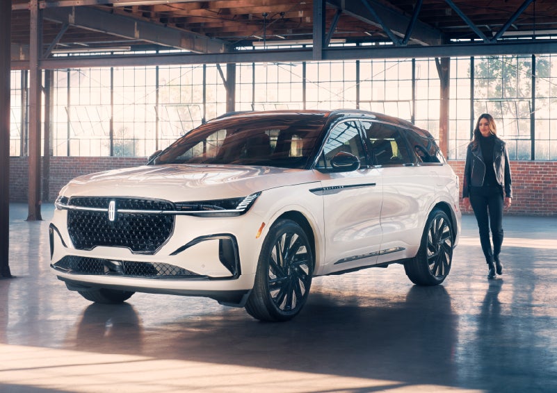 A person approaches a 2025 Lincoln Nautilus® SUV. | Parks Lincoln of Wesley Chapel in Wesley Chapel FL