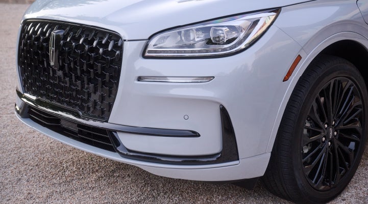 The all-black grille of the available Jet Appearance Package on a 2026 Lincoln Corsair® SUV is shown. | Parks Lincoln of Wesley Chapel in Wesley Chapel FL