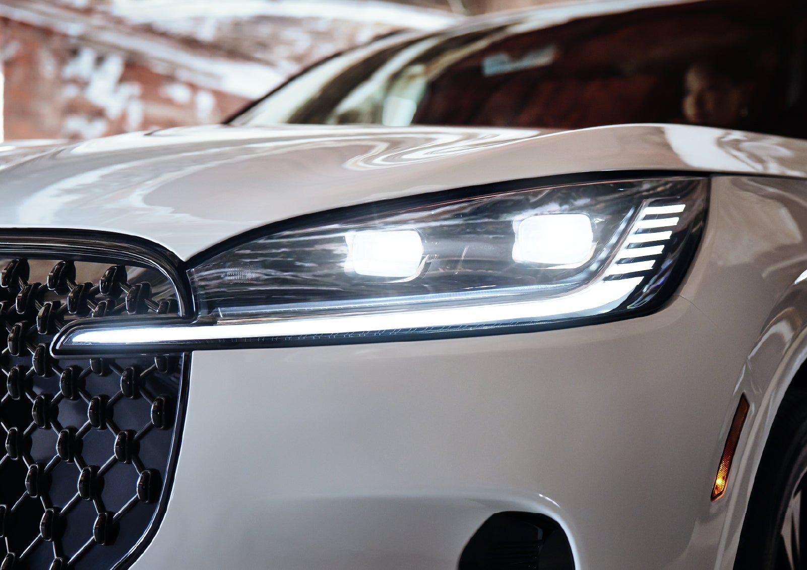 A close-up of a headlamp on the 2027 Lincoln Aviator® SUV is shown. | Parks Lincoln of Wesley Chapel in Wesley Chapel FL
