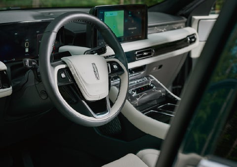 The leather-trimmed steering wheel of a 2027 Lincoln Aviator® Black Label™ SUV. | Parks Lincoln of Wesley Chapel in Wesley Chapel FL